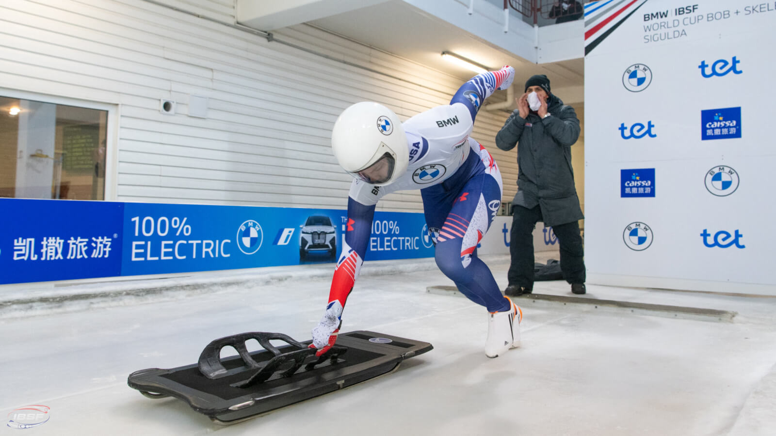 Kelly Curtis begins a run on a skeleton track as she trains for the Winter Olympics.